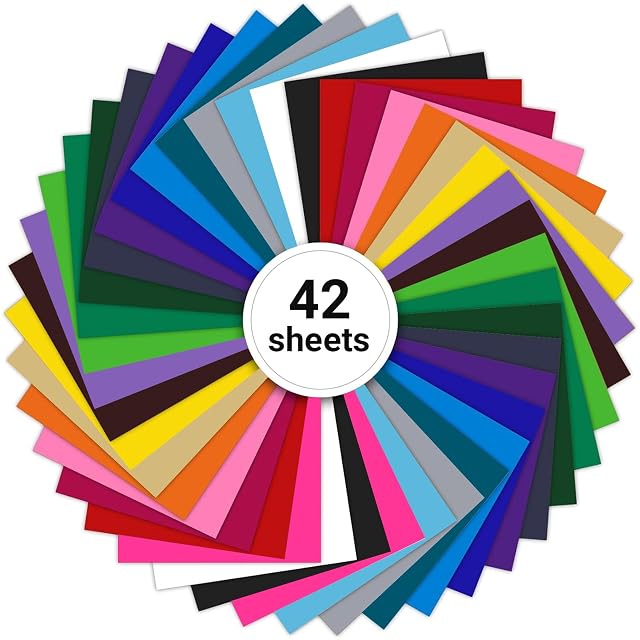 Quarantadue fogli di vinile colorati disposti in cerchio intorno a un’etichetta 42 sheets
