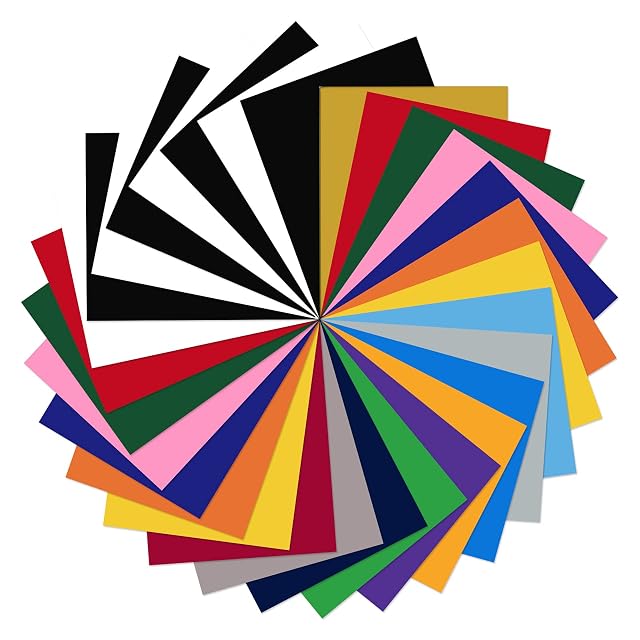 Fogli di vinile colorati disposti in cerchio, tra cui nero e bianco